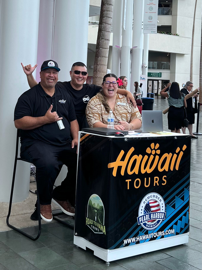 Photo of Lawrence Kim with Hawaii Tours staff members